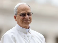 Pope Leo XIV smiles during his first general audience in St. Peter's Square on May 21, 2025.