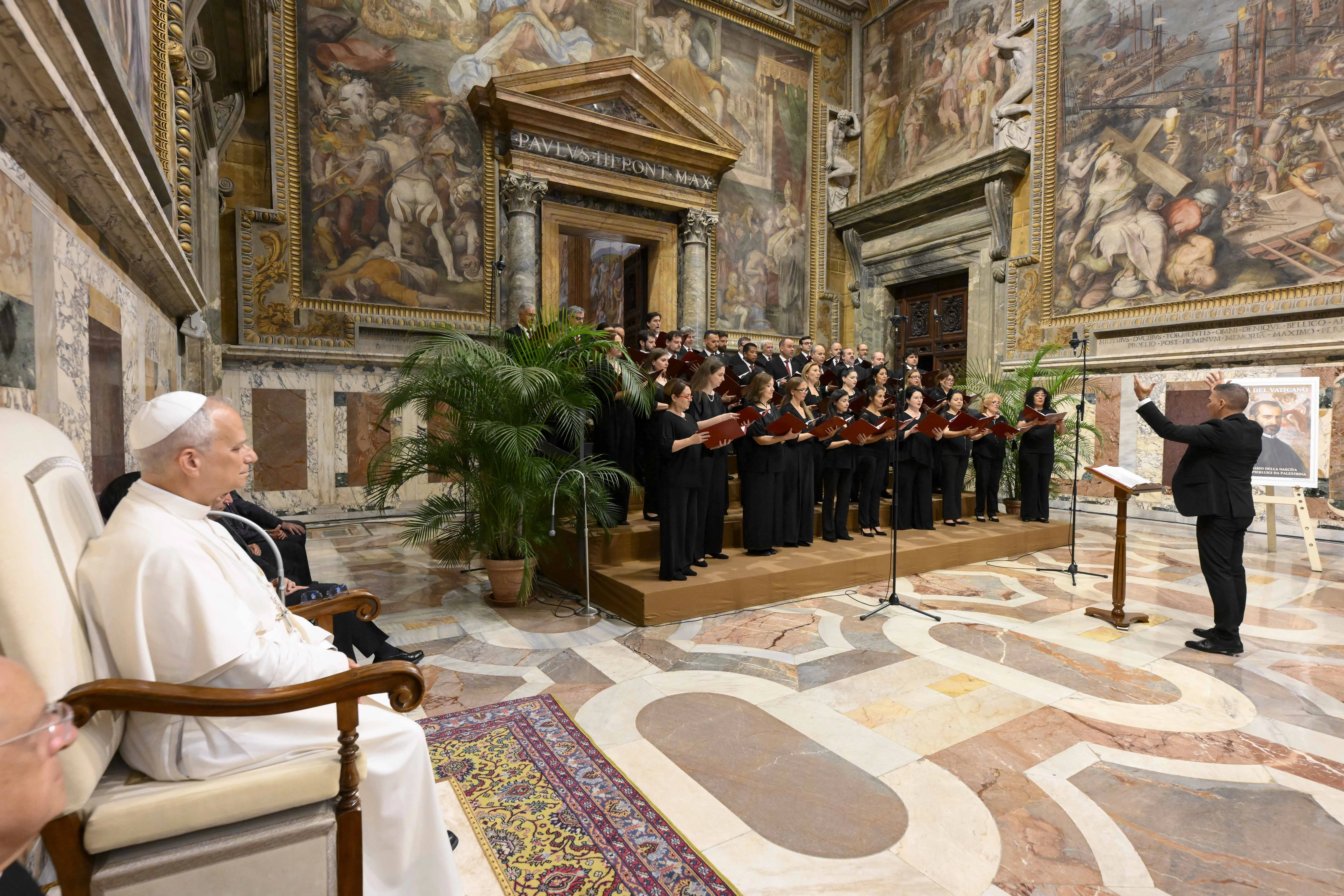 Pope Leo XIV listens to the choir during an audience with participants of an event organized by the Domenico Bartolucci Foundation on June 18, 2025.?w=200&h=150