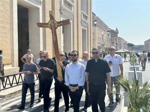 Seminarians approach the Holy Door at St. Peter’s Basilica, Tuesday, June 24, 2025. Credit: Courtney Mares/CNA