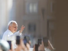 Pope Leo XIV waves to pilgrims at the Wednesday general audience in St. Peter's Square, Wednesday, June 25, 2025