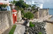 Scene of the walled city of Old San Juan, Puerto Rico. The oldest governor’s mansion under the American flag, La Fortaleza, is top right.
