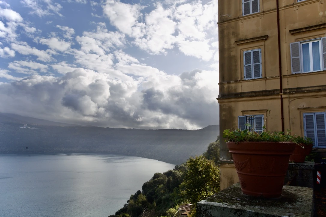 The Vatican Gardens at Castel Gandolfo is located on the wooded slopes of the Alban Hills, overlooking the blue waters of a small volcanic crater lake.?w=200&h=150