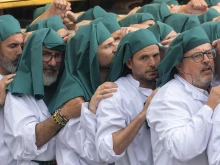 Marchers participate in the grand procession of the Jubilee of Confraternities in Rome, Saturday, May 17, 2025