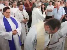 Anglican minister Vivian Schwanke De Oliveira in the entrance procession of the Mass for the installation of the archbishop of Chapecó in Brazil.