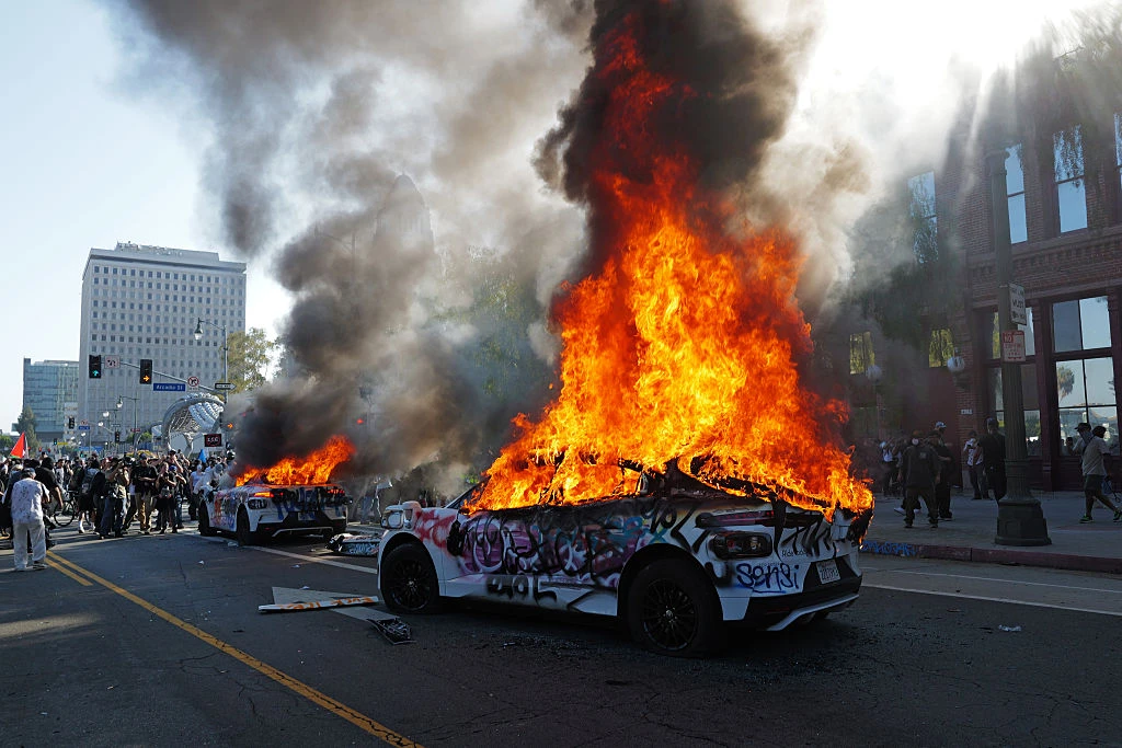 Waymo cars are set on fire and vandalized during a protest against immigration raids on June 8, 2025, in Los Angeles.?w=200&h=150