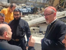 The Latin Patriarch of Jerusalem, Cardinal Pierbattista Pizzaballa speaks with Father Gabriel Romanelli, pastor of Holy Family Church, during his December 2024 visit to Gaza.