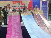 Activists display a long list of atrocities against minorities on the first 300 days of the Narendra Modi government on March 19, 2015.