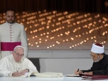 Pope Francis and Grand Imam Ahmed al-Tayeb sign the Document on Human Fraternity for World Peace and Living Together in 2019 .