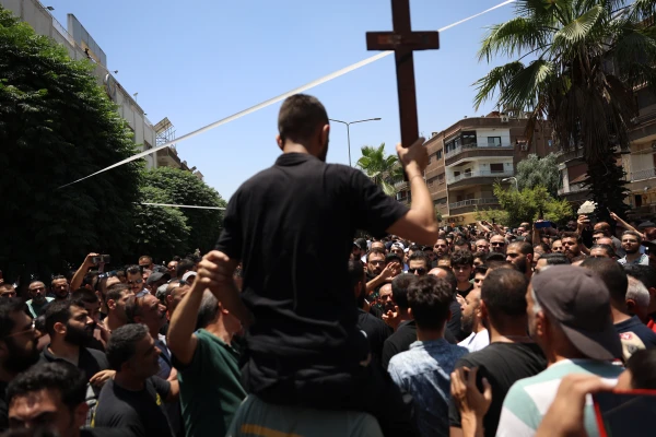 In a scene marked by deep sorrow and righteous anger, churches across Syria held funeral services on June 24, 2025, for the victims of the suicide bombing that targeted St. Elias Church in the Syrian capital, Damascus. The June 22 attack claimed the lives of 25 people and left dozens injured. Credit: Mohammad Al-Rifai/ACI MENA