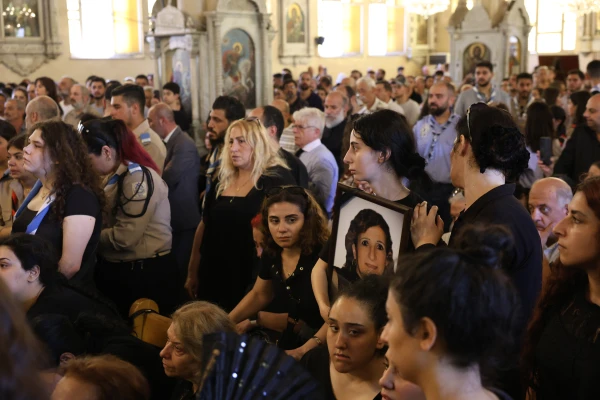 Mourners gather in the Church of the Holy Cross in Qassaa, Damascus, for the funeral of many who lost their lives in a terrorist attack at the Mar Elias Church in the Dweila neighborhood of Syria's capital on Sunday, June 22, 2025. Credit: Mohammad Al-Rifai/ACI MENA