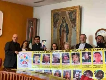 Bishop Francisco Javier Acero with the mothers of the disappeared and priests.