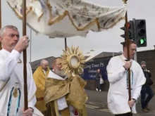 Thousands of people walk prayerfully together through the streets during a Eucharistic procession in Derry, Ireland, on the feast of St. Brigid, Feb. 1, 2025.