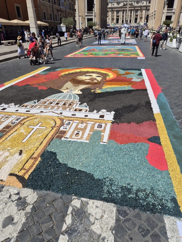 Murals made of flowers adorned The Via della Conciliazione, the grand avenue leading to St. Peter’s Square, which was transformed on Sunday into a vibrant tapestry of color. June 29, 2025. Credit: Hannah Brockhaus