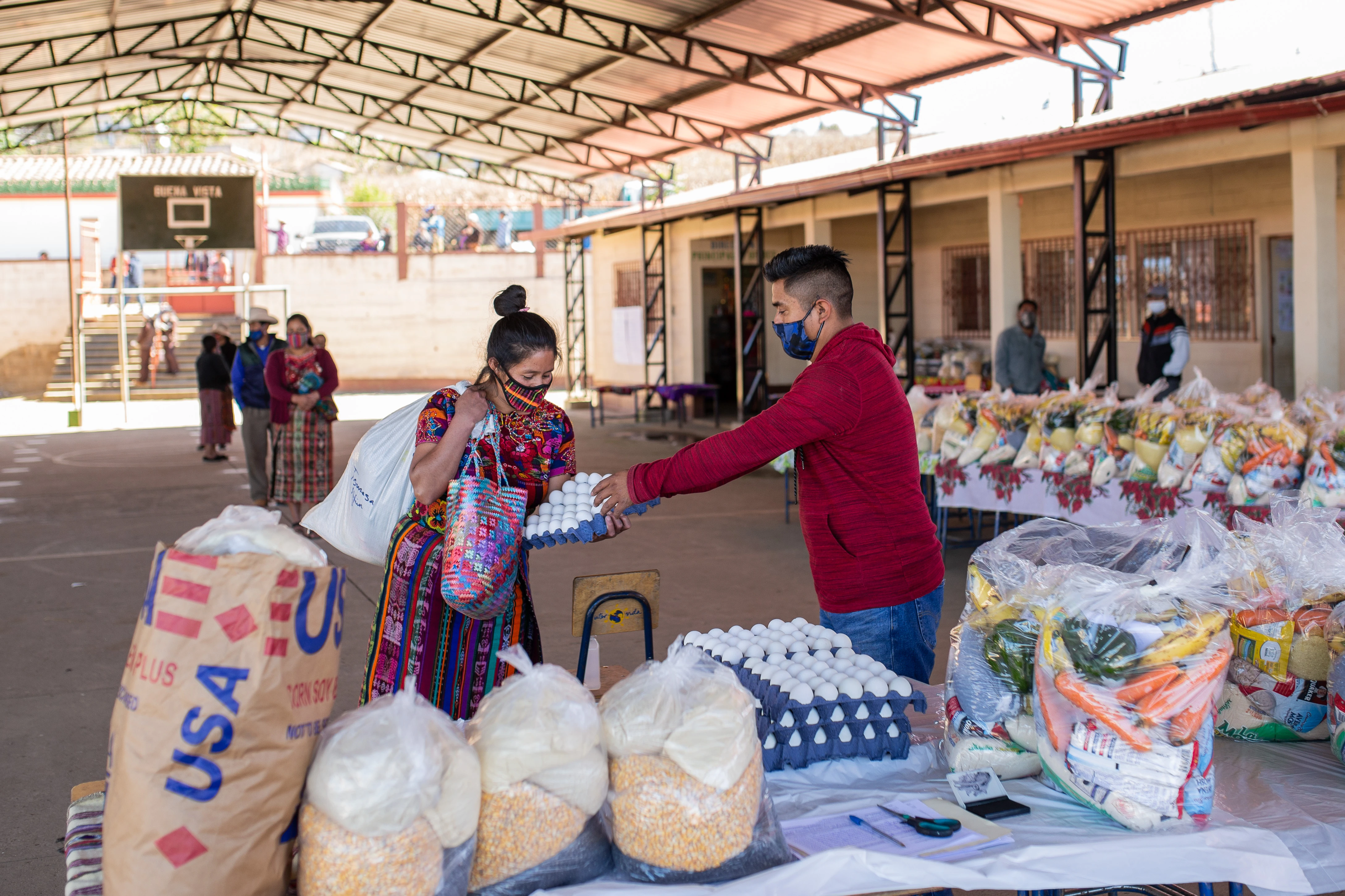 Catholic Relief Services distributes food for school children at one of the schools in the Department of Totonicapán, Guatemala, with the help of parent volunteers.?w=200&h=150