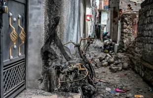 A burnt scooter on May 9, 2025, stands on the spot where twins Zian Khan and Urwa Fatima died on May 7 during Pakistani artillery shelling in the main town of Poonch district. Credit: PUNIT PARANJPE/AFP via Getty Images