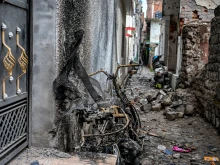 A burnt scooter on May 9, 2025, stands on the spot where twins Zian Khan and Urwa Fatima died on May 7 during Pakistani artillery shelling in the main town of Poonch district.