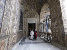Pope Leo XIV walks in the corridor of the third loggia of the Apostolic Palace, where the papal apartment is located, on May 12, 2025, in Vatican City.