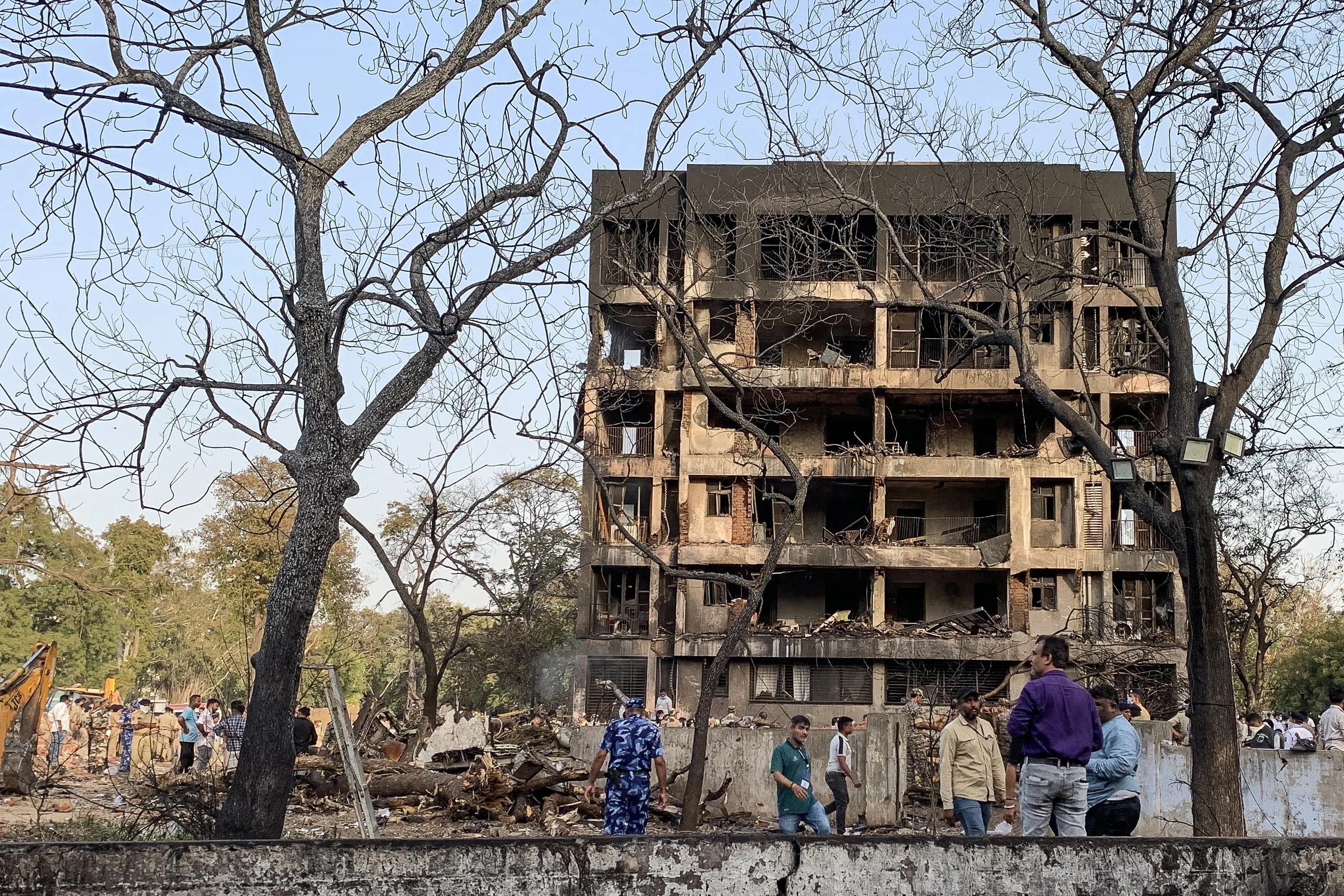 A general view shows a damaged building at the site where Air India flight 171 crashed in a residential area near the airport in Ahmedabad on June 12, 2025.?w=200&h=150