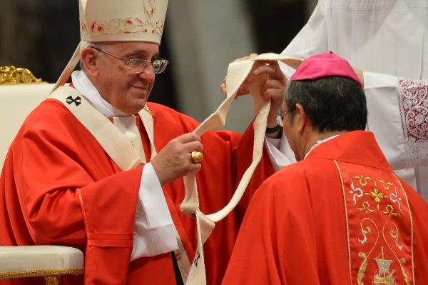 New archbishop of Ho Chi Min (Vietnam) Paul Bui Van Doc receives the Pallium from Pope Francis during a mass for the new metropolitan archbishops and the solemnity of Sts. Peter and Paul on June 29, 2014, at St. Peter's Basilica in Vatican. Credit: VINCENZO PINTO/AFP via Getty Images