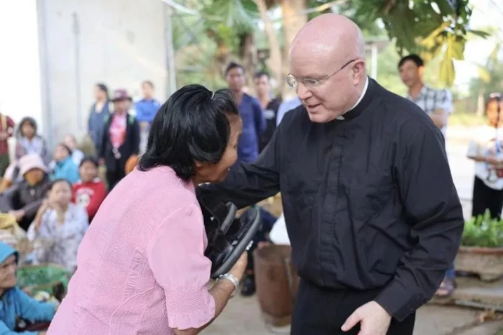 At a leper colony in the Kon Tum area in Vietnam in April 2025, Pontifical Missions Society USA President Monsignor Roger Landry celebrated Mass, brought Communion to people, and distributed food and sandals.?w=200&h=150
