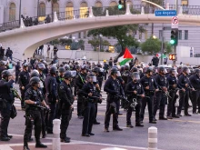 LAPD rally as a curfew takes effect in Los Angeles on June 10, 2025, following days of protests in response to federal immigration operations that saw clashes spread across downtown.