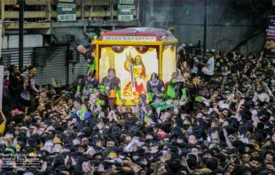 The miraculous image of Jesus Nazareno makes its way through the streets of Manila surrounded by thousands of devotees during the Traslacion procession celebrated annually on Jan. 9. Credit: Photo courtesy of the Minor Basilica and National Shrine of Jesus Nazareno, Quiapo, Manila