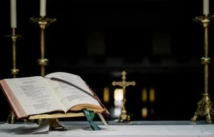 Lectionary on altar table at Mass Credit: Grant Whitty / Unsplash