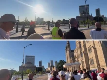 Stills from a video shared with EWTN News and taken by the pilgrims on May 30, 2025, while the procession was in the Diocese of Tulsa, Oklahoma, show Catholic participants in the procession walking and singing while a young man on the sidelines, speaking through a bullhorn and walking alongside the crowd, deplores Eucharistic devotion as “idolatry.”