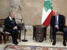 Lebanese President Joseph Aoun (right) welcomies Sovereign Order of Malta Grand Chancellor Riccardo Paternò di Montecupo and the delegation at Baabda's presidential palace on March 14, 2025.