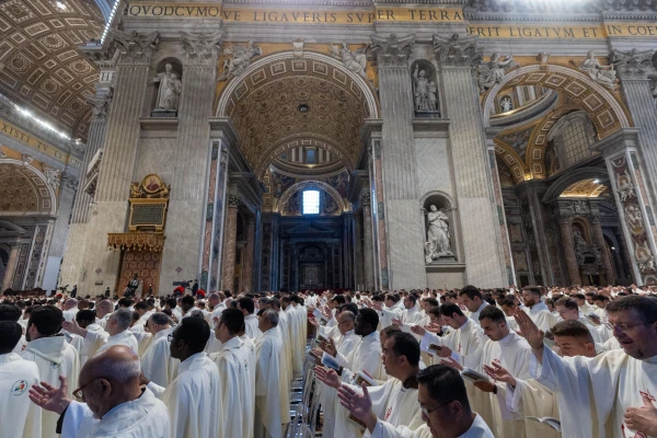 Priests stand under the soaring canopies of St. Peter’s Basilica on the solemnity of the Most Sacred Heart of Jesus, Friday, June 27, 2025. Credit: Daniel Ibáñez/CNA
