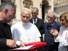 Pope Leo XIV speaks with prisoners who attended his general audience on June 4, 2025.