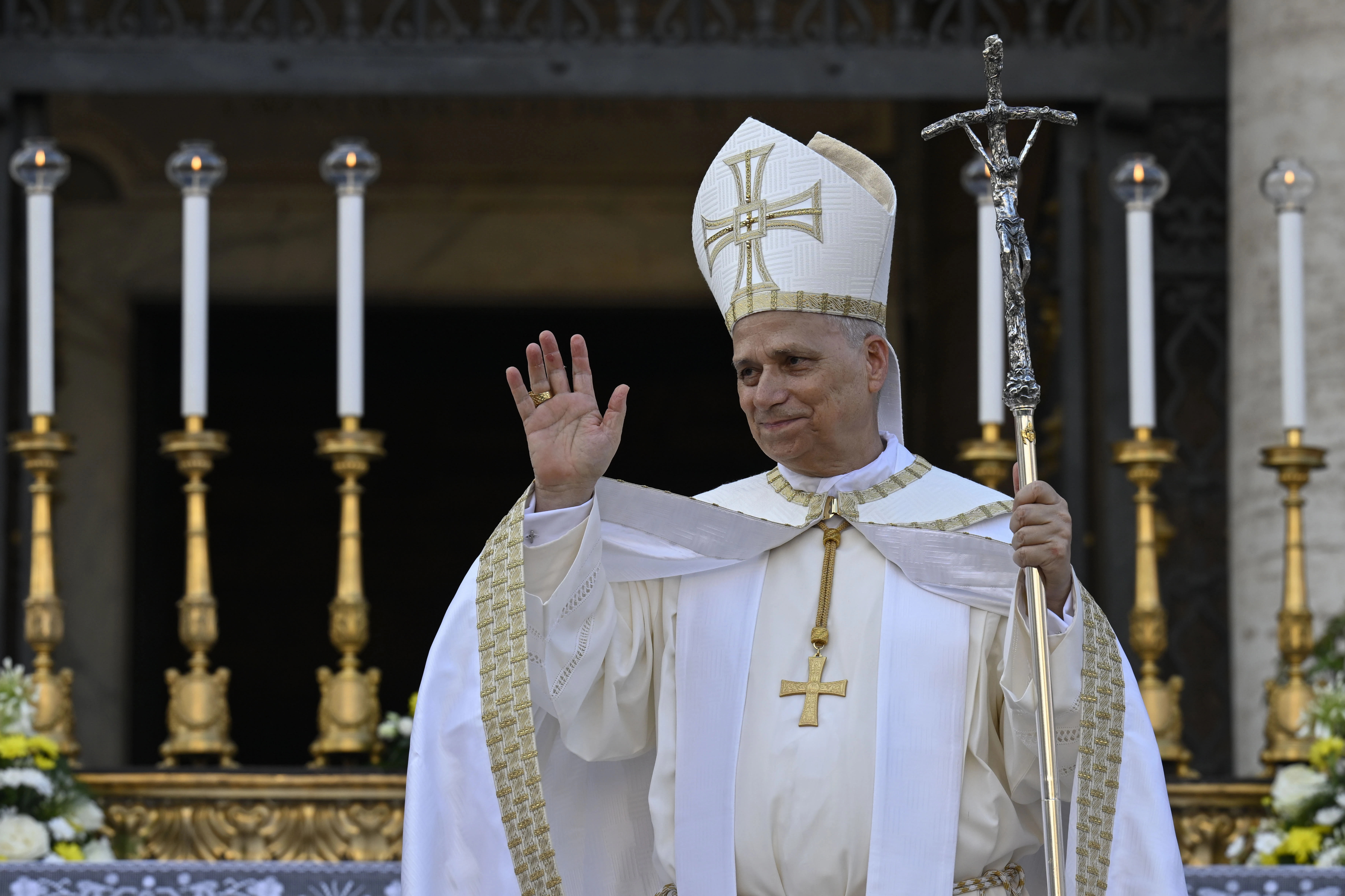 Pope Leo XIV waves to those gathered for Mass on the solemnity of Corpus Christi on Sunday, June 22, 2025, in Rome.?w=200&h=150