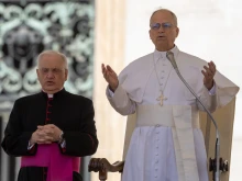 Pope Leo XIV prays with pilgrims gathered in St. Peter’s Square at the Vatican for his general audience on Wednesday, May 28, 2025.