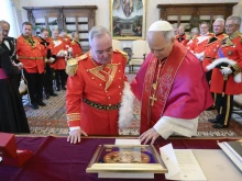 Pope Leo XIV meets with the Order of Malta’s grand master, Fra’ John Dunlap, and members of the Order of Malta on June 23, 2025, at the Vatican.