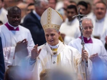Pope Leo XIV waves to those gathered for Mass for the Jubilee of Sport on the solemnity of the Most Holy Trinity on June 15, 2025, in St. Peter’s Basilica at the Vatican.