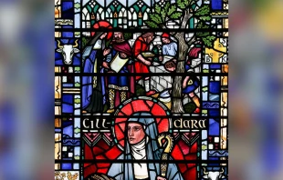 St. Brigid of Kildare building the Church of the Oak, detail from a window of St. Etheldreda’s Church in London. Credit: Lawrence OP via Flickr (CC BY-NC-ND 2.0)