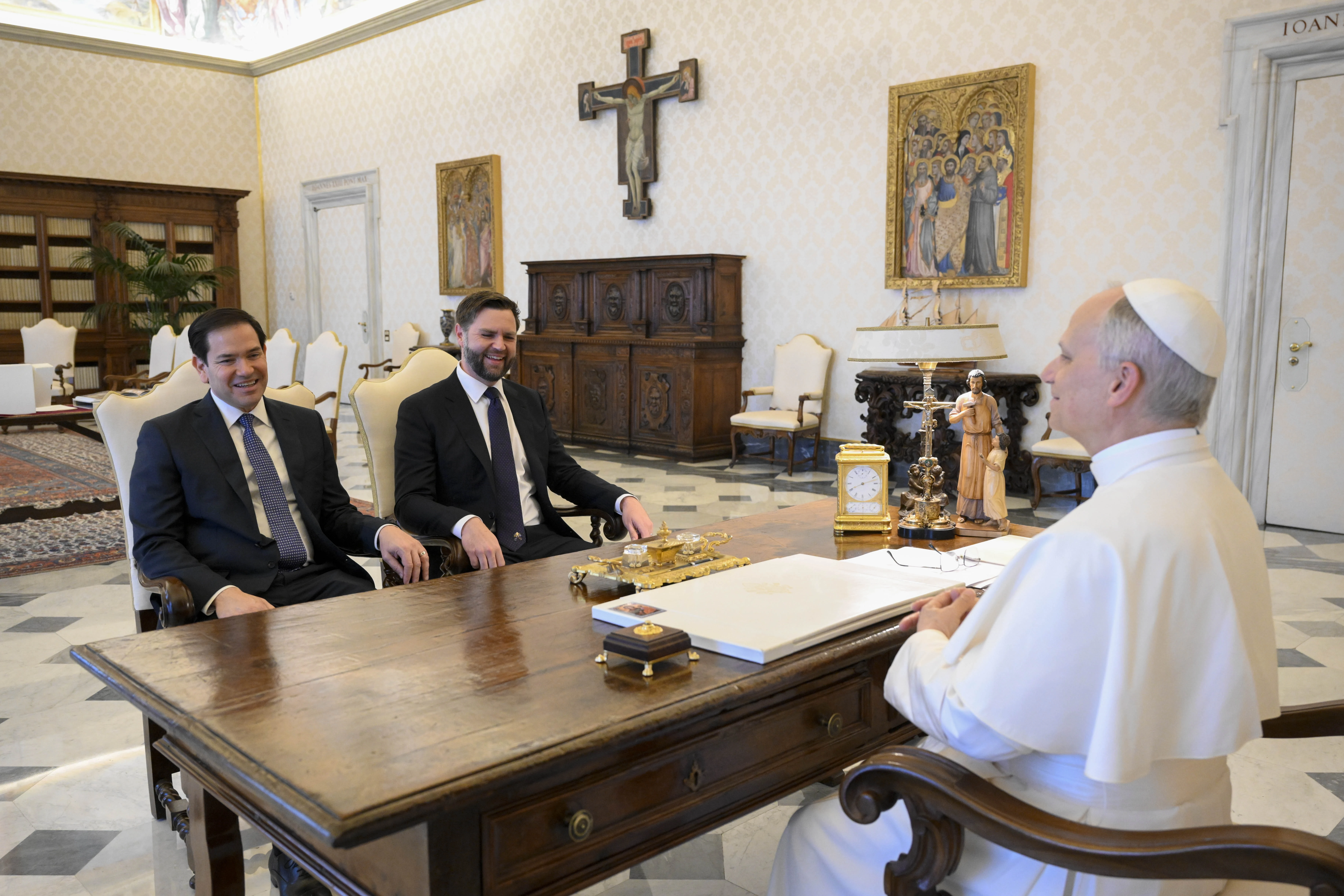 U.S. Vice President JD Vance and Secretary of State Marco Rubio, seated in places of honor usually reserved for heads of state, meet with Pope Leo XIV in the papal library on May 19, 2025.?w=200&h=150