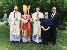 Brothers Father Joseph Wahlmeier (pictured on the left) and newly-ordained Father Isaac Wahlmeier (on the right), with their parents and Bishop James D. Conley after the ordination Mass May 24, 2025.