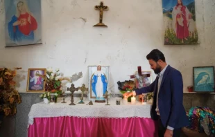 Despite being Yazidi, a religious minority that has suffered persecution in Iraq, Wael Jejo Khdeida, along with his wife, tends to Mar Odisho Church in northern Iraq without pay and treats it as sacred. Credit: Ismail Adnan/ACI MENA