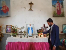 Despite being Yazidi, a religious minority that has suffered persecution in Iraq, Wael Jejo Khdeida, along with his wife, tends to Mar Odisho Church in northern Iraq without pay and treats it as sacred.