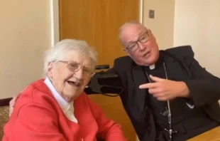 Cardinal Timothy Dolan, archbishop of New York, with Sister Mary Bosco of the Sisters of Mercy, a 100-year-old Irish nun who taught him to “love and serve the Lord.” Credit: Photo courtesy of Cardinal Dolan