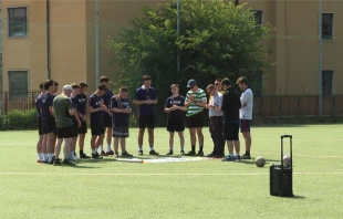 Athletes pray before a match organized by the Caritas Cup in Rome, Saturday, June 14, 2025. Credit: EWTN News