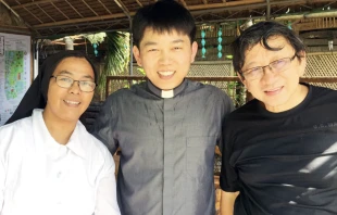 Father Paul Goo, center, is pictured during a missions trip to the Philippines in 2017. He will serve in the Vatican's Secretariat of State beginning in January 2025. Goo is pastor of Christ the Redeemer Parish in West Vancouver, British Columbia, Canada. Credit: Photo courtesy of The B.C. Catholic