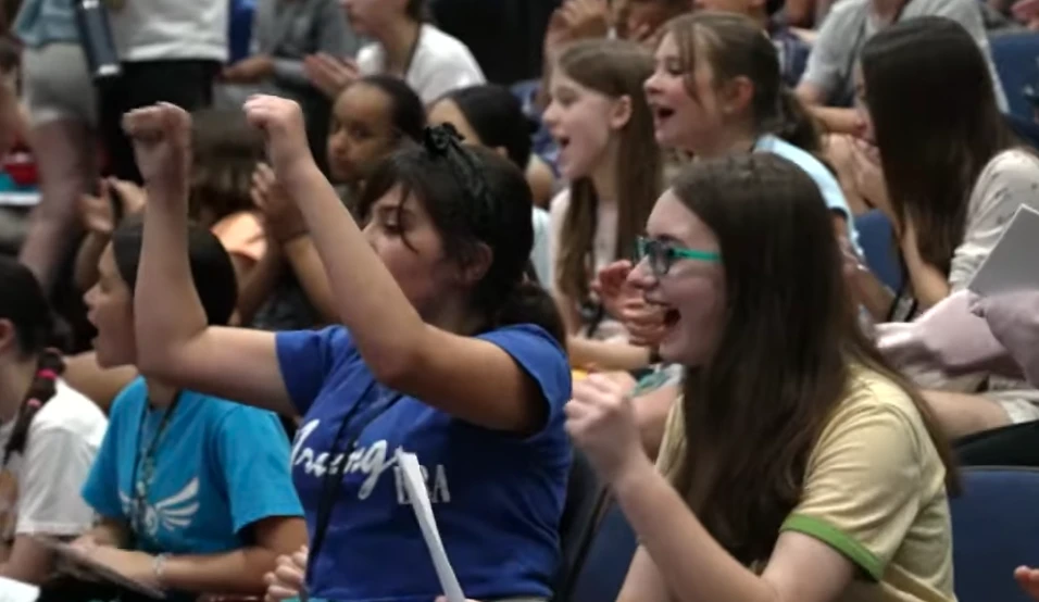 Young students cheer during an assembly at Bishop O’Connell High School in Arlington, Virginia, Saturday, May 10, 2025.?w=200&h=150